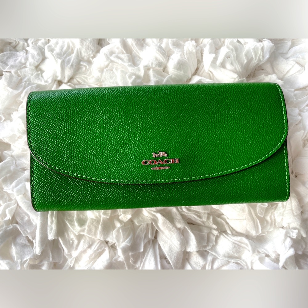 Bright green COACH envelope wallet.  Like new.